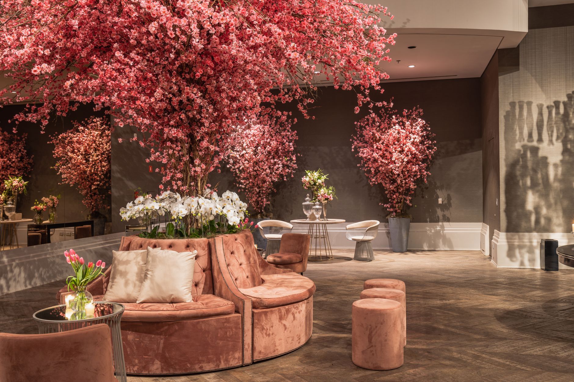 Elegant indoor lounge featuring cherry blossom decorations and plush seating for a sophisticated ambiance. — "Classic Wooden