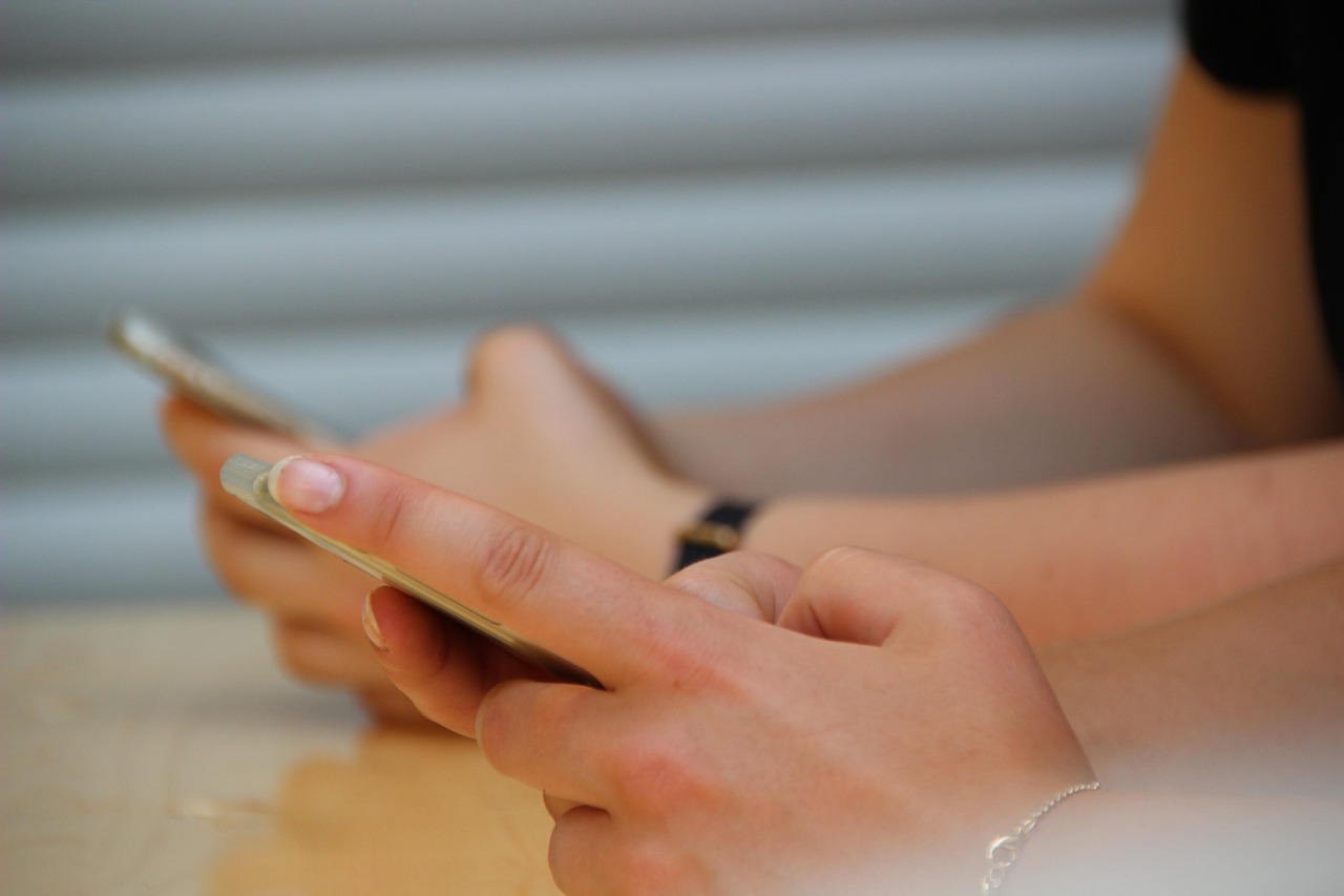 Mobile, hands, smartphone — How to Use an Instagram Fake Followers Checker (And Why It Matters)