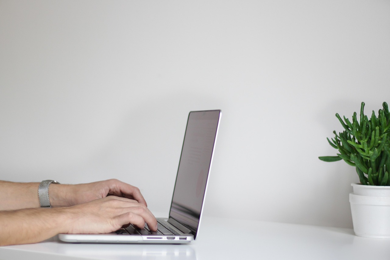 Hands, laptop, working — "Innovative Solutions: How a Web Design Agency in London Can Elevate Your Business"