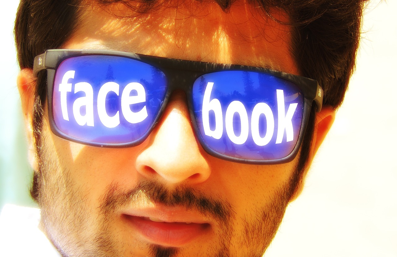 Social media, man, face — Reasons Authors Should Embrace Social Networking