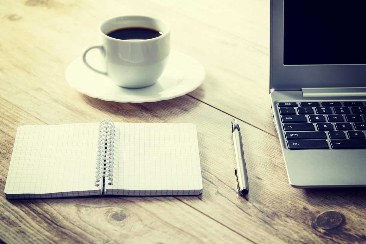 Coffee, computer, coffee cup — Smart Solutions: Navigating Implementation Challenges for Driver's License Barcode Systems