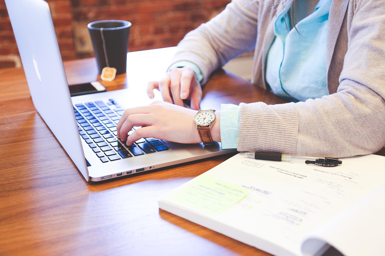 Student, typing, keyboard — Top Industries That Rely on Robust ID Verification